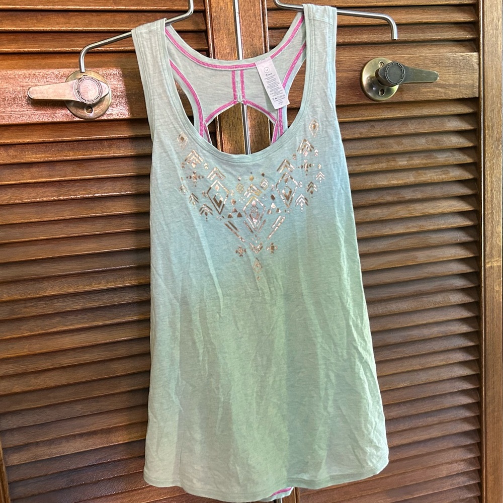 Ivivva size 14 peppermint tank with cute cut out on the back